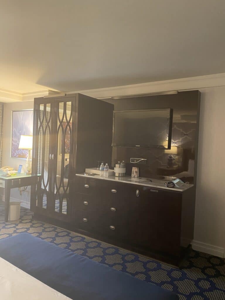 Bellagio Stay Well King Room Tour - Bedroom wet bar, tv, and dresser