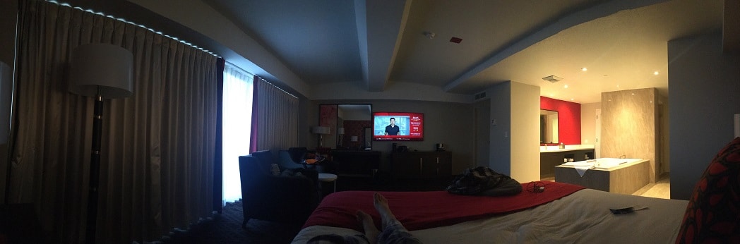 wide view of a corner suite room