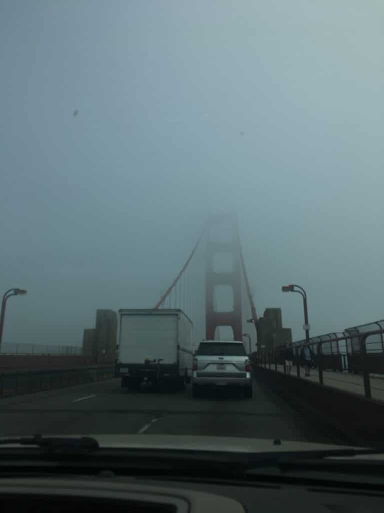 foggy view driving across the Golden Gate Bridge