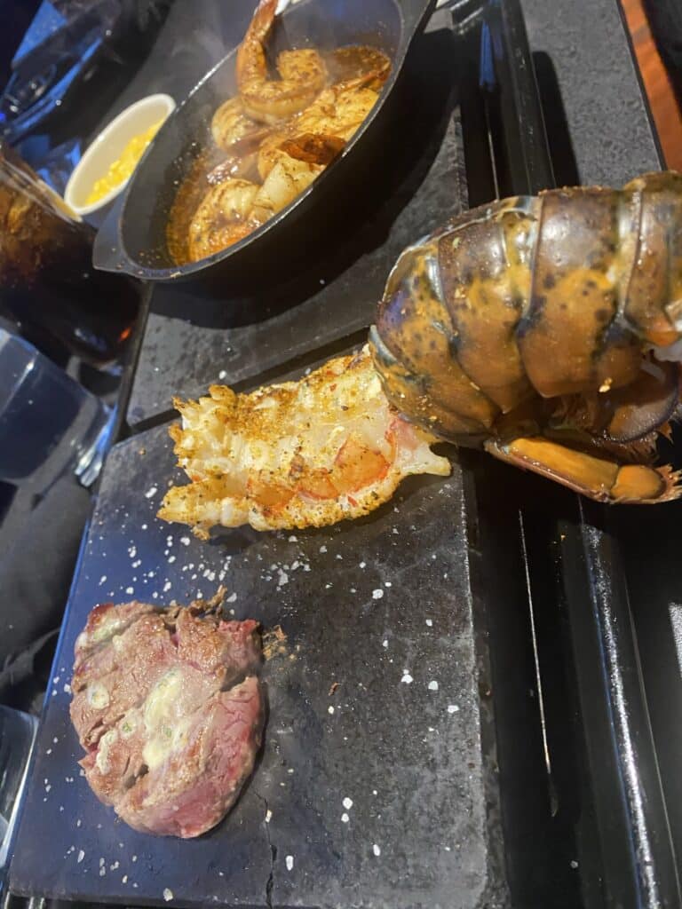 Black Rock Bar & Grill - Dayton, Ohio - lobster tail, shrimp, and steak cooking on a 755-degree volcanic rock