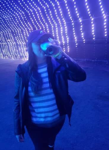 drinking wine in a Halloween light tunnel