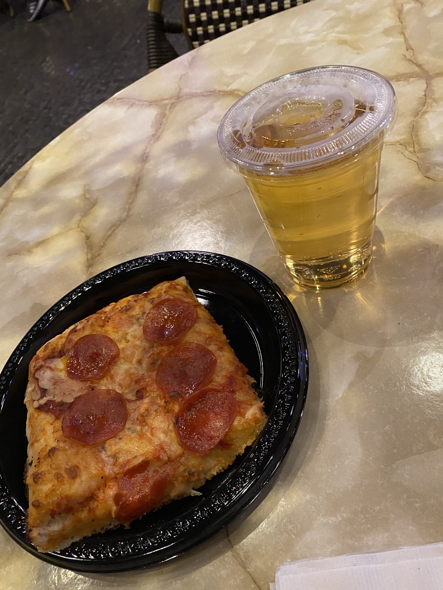 Sirrico's Pizza - slice of pizza and a glass of beer