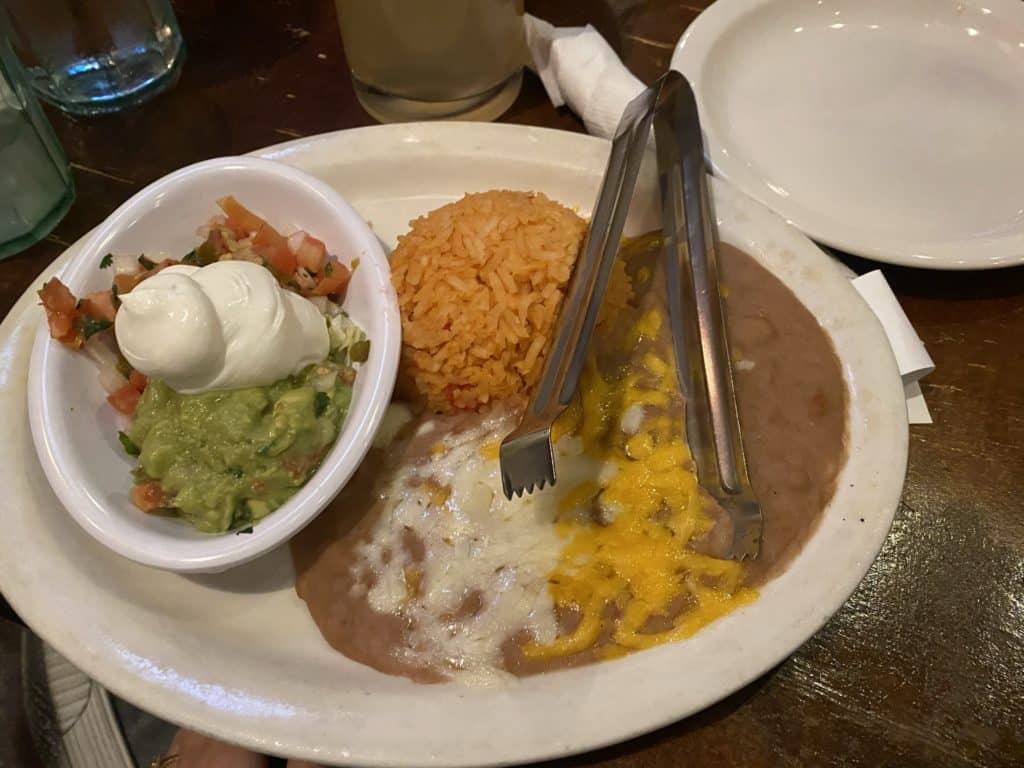 refried beans with cheese, rice, guacamole, salsa, and sour cream fajita toppings from Juan's Flaming Fajitas in Las Vegas