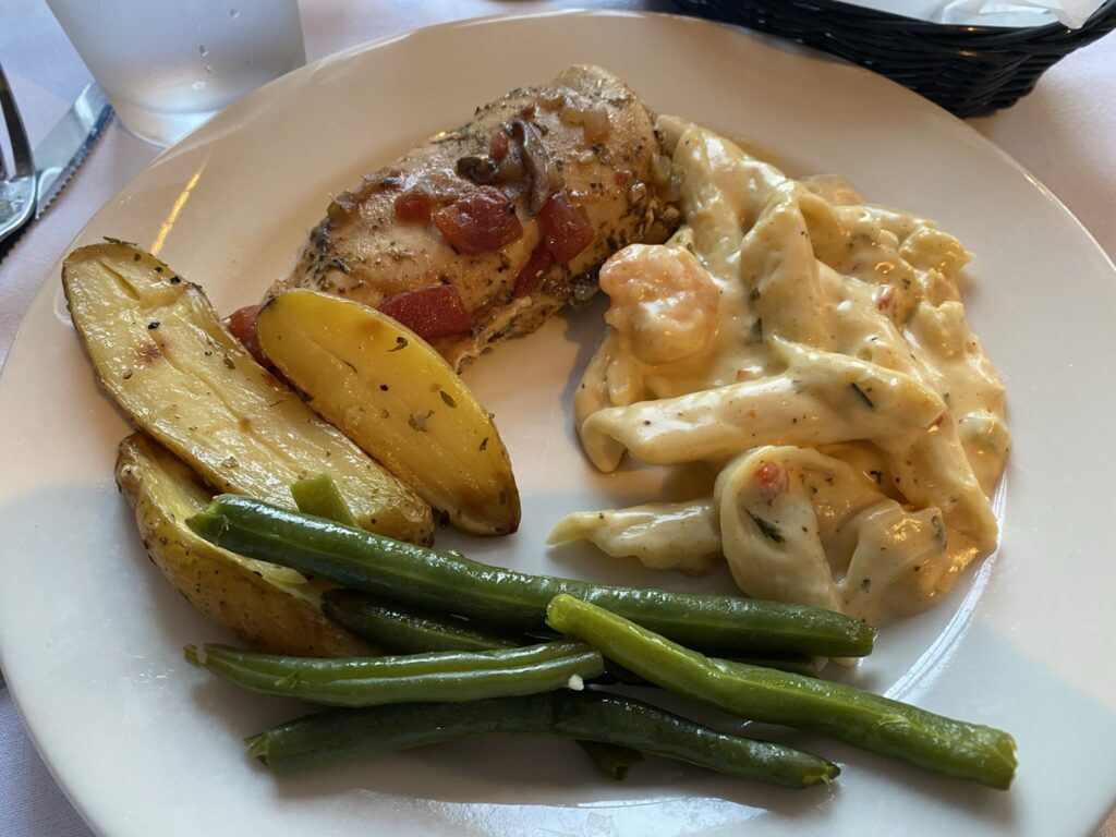 New Orleans Jazz Dinner Cruise - baked chicken, seafood pasta, potatoes, and green beans