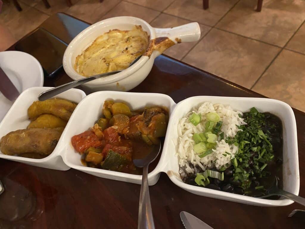 Pampas Brazilian Steakhouse Las Vegas - side dishes of au gratin potatoes, plantains, and more