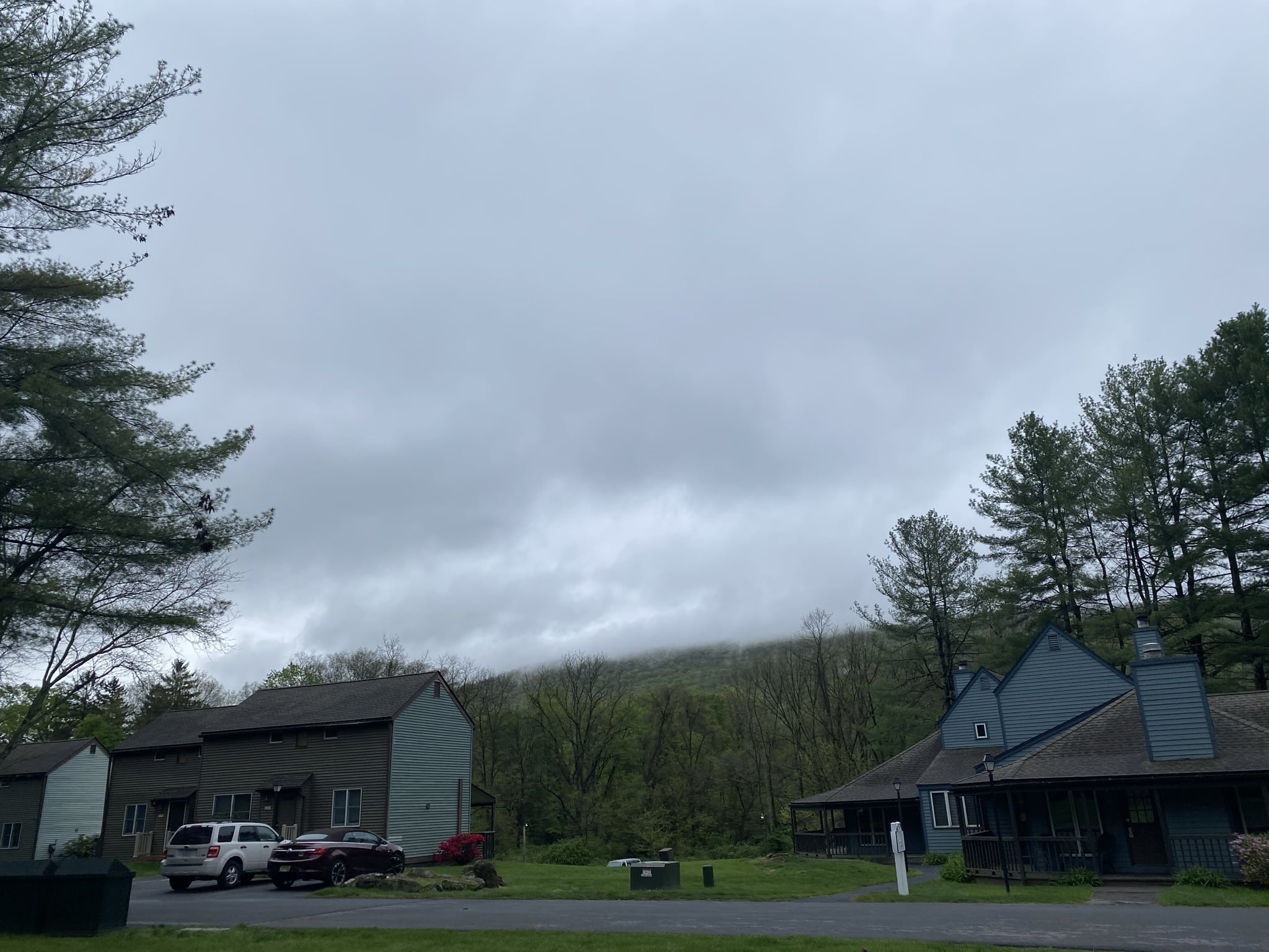 view of other cabins on a cloudy day from our parking spot