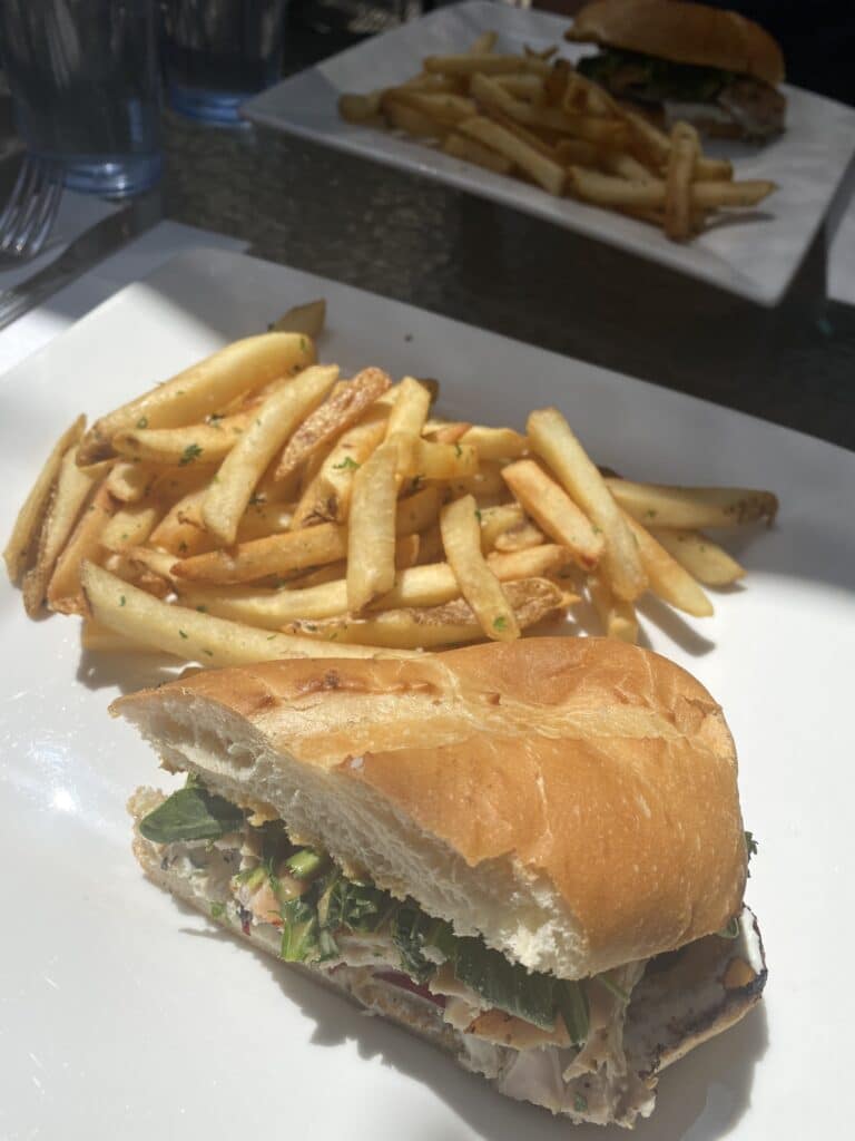 Provençal Chicken Sandwich and french fries from V Bistro and Bar in Downtown Murphys