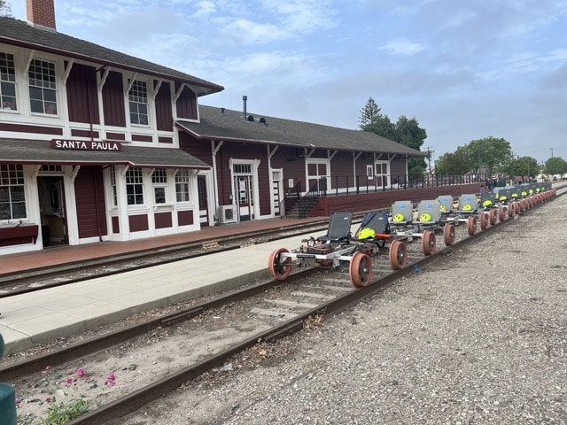 Sunburst Rail Bikes in Santa Paula, California - bikes lined up on the railroad tracks at the train station