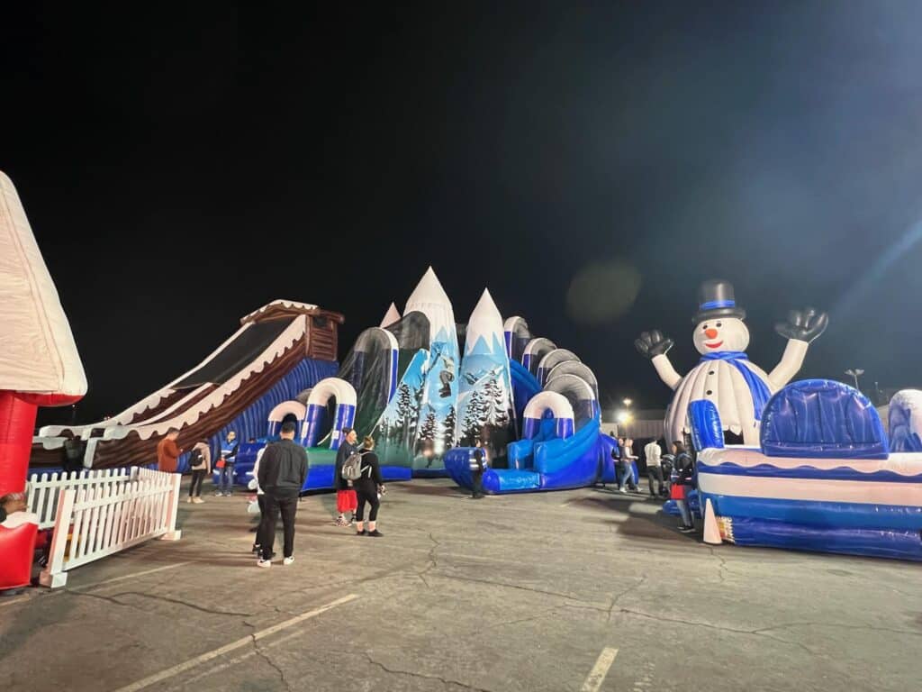 inflatable slides and obstacle courses at Winter Fest