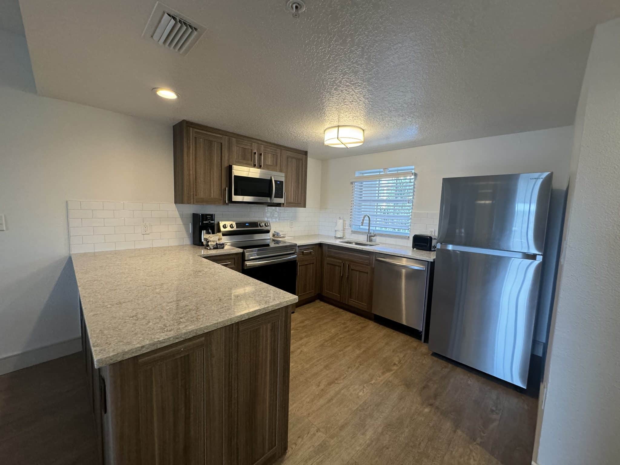 newly renovated, modern full kitchen with tons of counter space