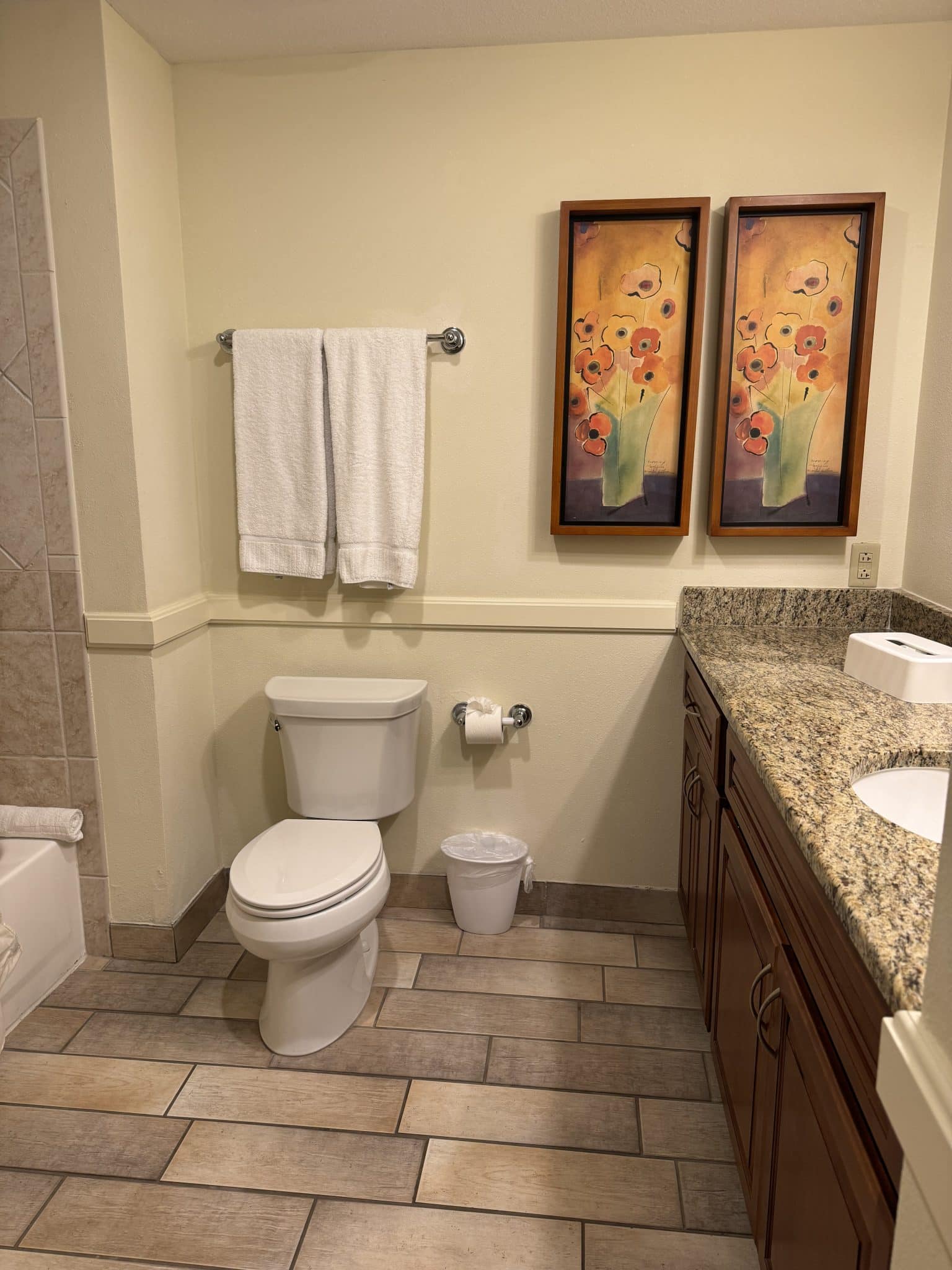 2nd bathroom with toilet, vanity, and bathtub