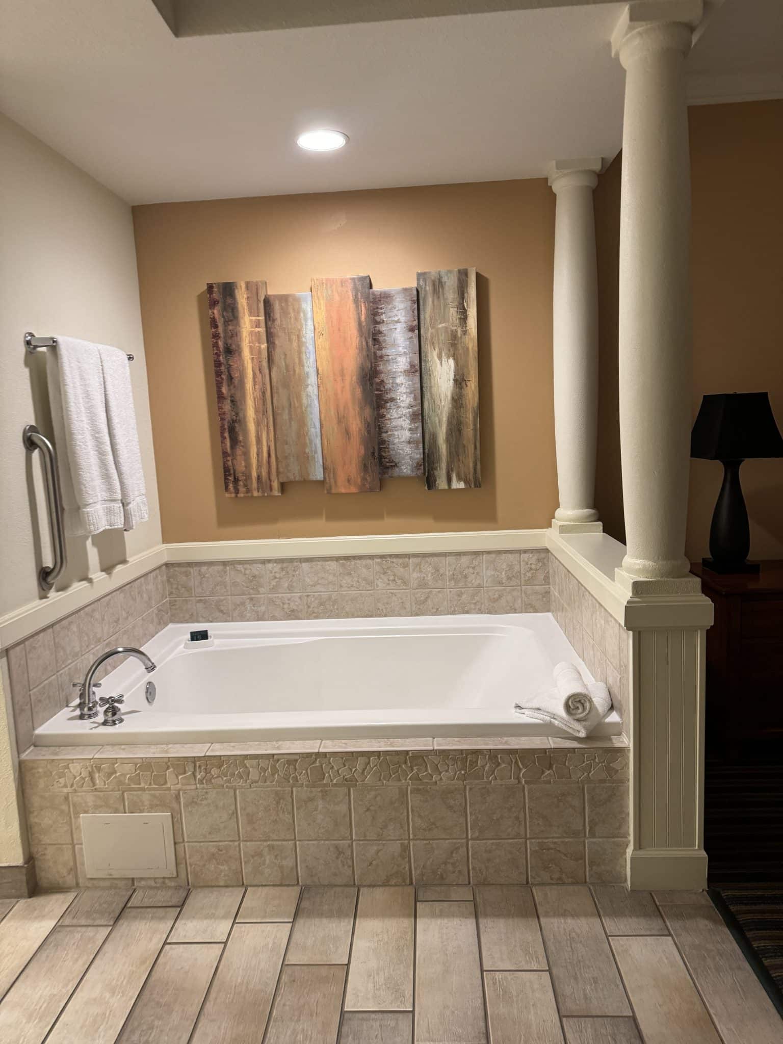 large jacuzzi tub in the center of the primary bedroom