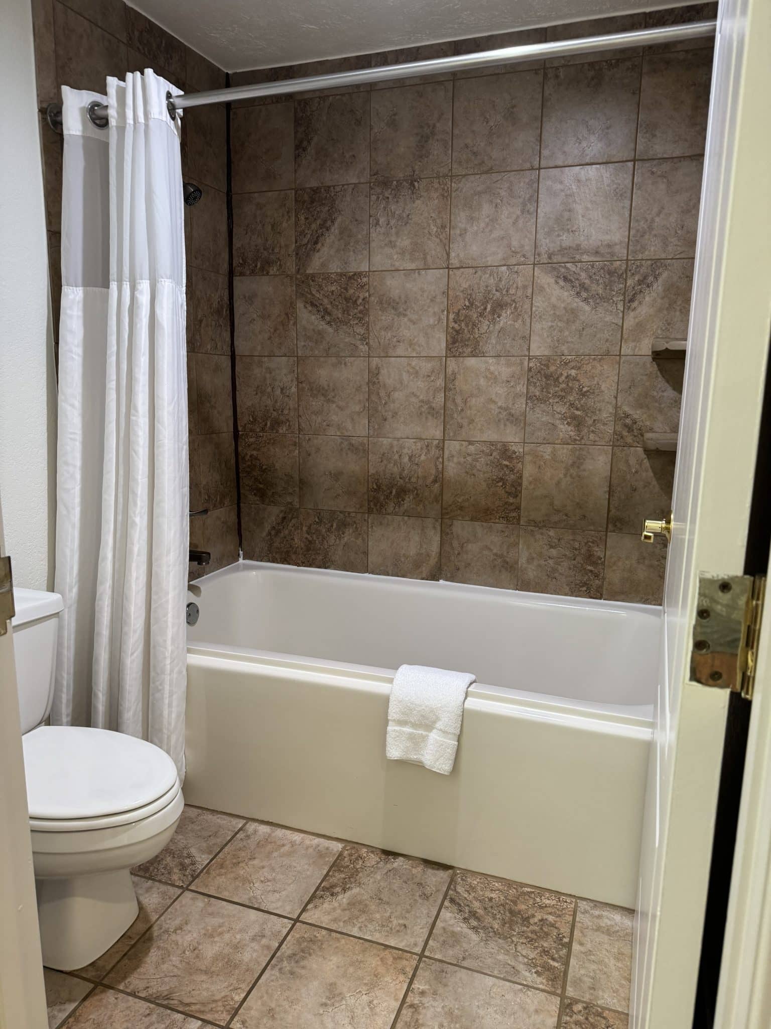 bathroom with bathtub and toilet
