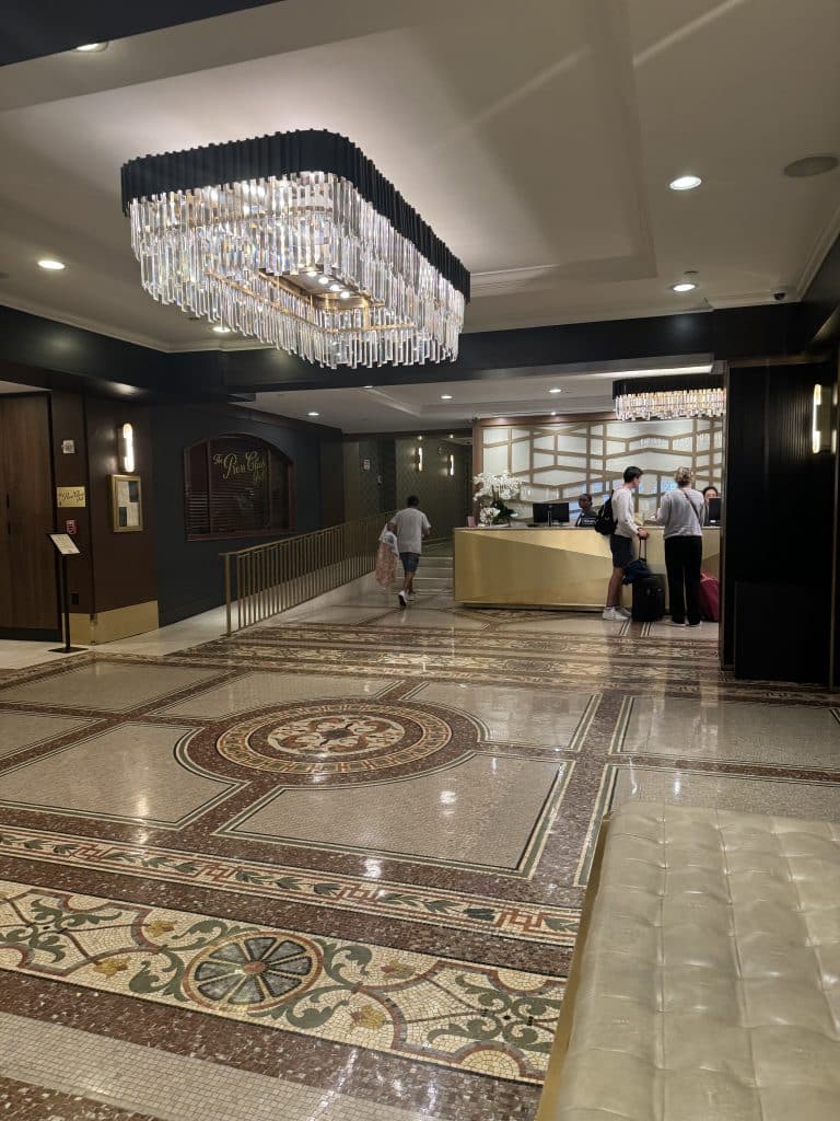 lobby chandeliers and marble flooring at Martinique New York