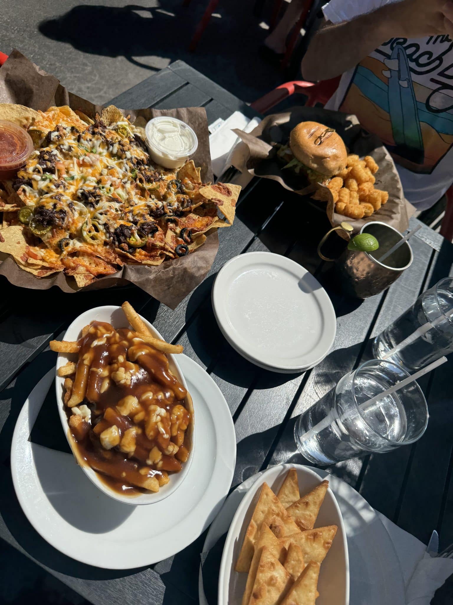 poutine, nachos, and burger from Loose Goose pub in Windsor, Canada