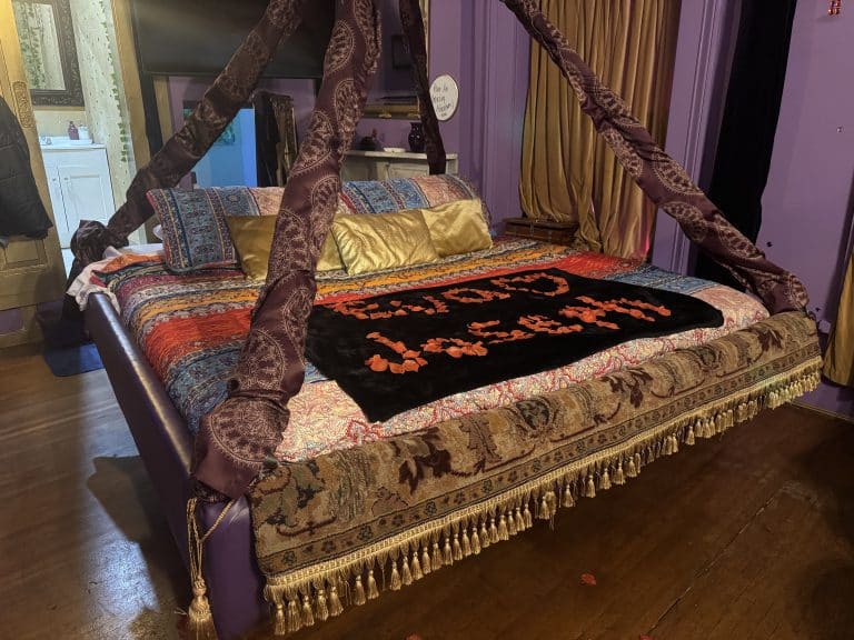 Flying Magic Carpet themed floating bed with rose petals of our names
