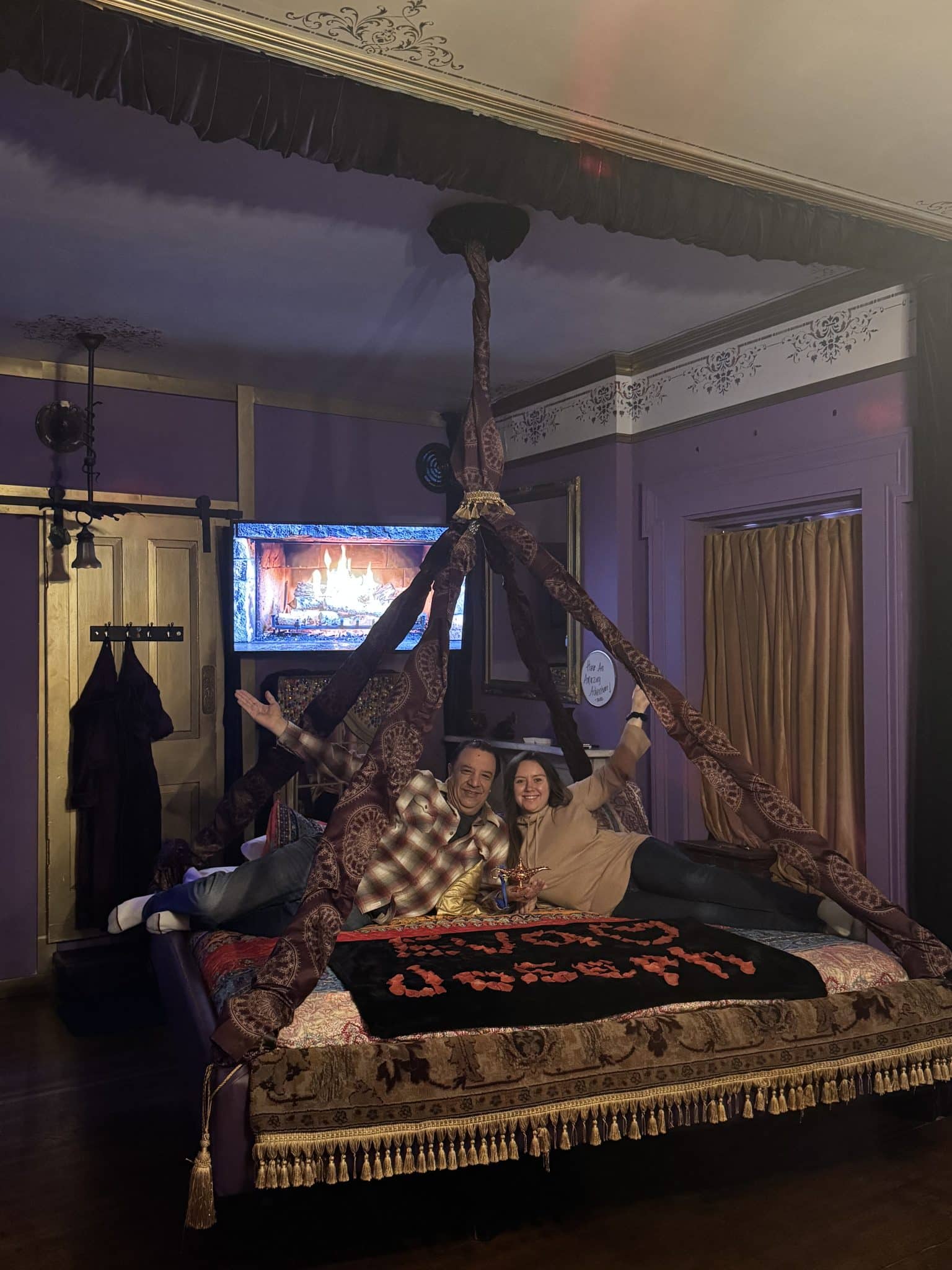 photo of us on the flying carpet bed with our names in rose petals
