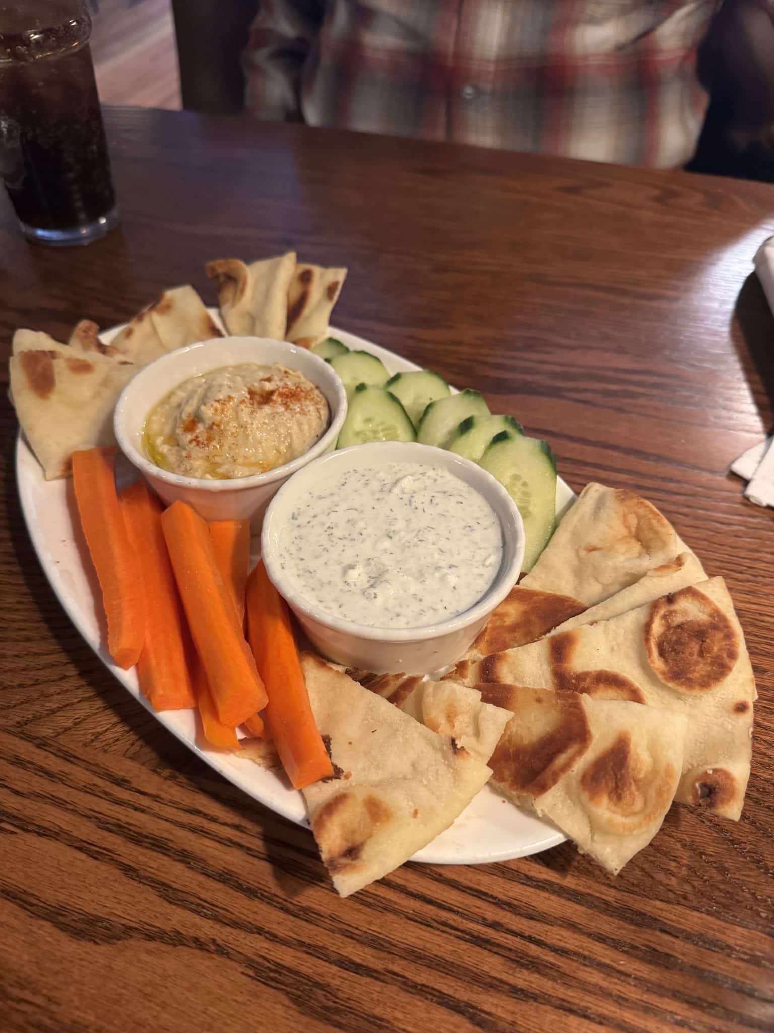 hummus and tzatziki plate with naan bread, carrots, and cucumbers from Bickerdyke in Mount Vernon, Ohio